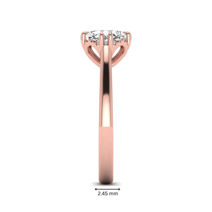 Cushion cut lab grown diamond solitaire engagement ring with double claw prongs, diamond-accented open cathedral gallery, and polished rose gold band.