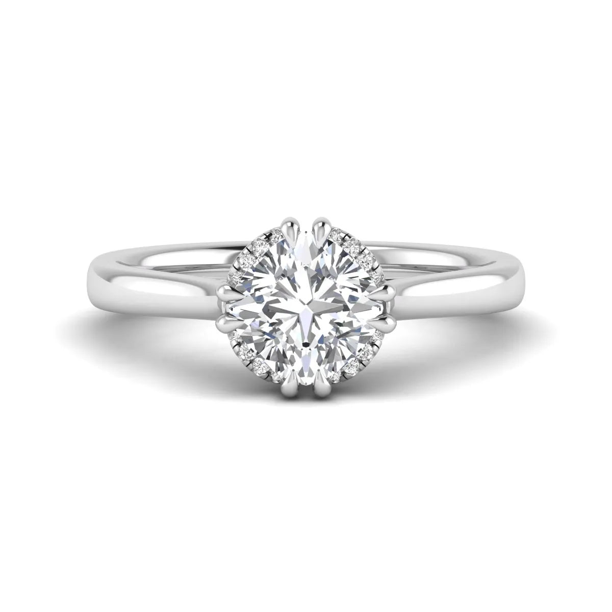 Cushion cut lab grown diamond solitaire engagement ring with double claw prongs, diamond-accented open cathedral gallery, and polished white gold band.