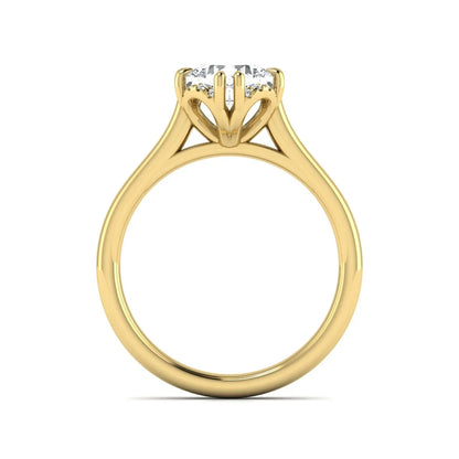 Cushion cut lab grown diamond solitaire engagement ring with double claw prongs, diamond-accented open cathedral gallery, and polished yellow gold band.