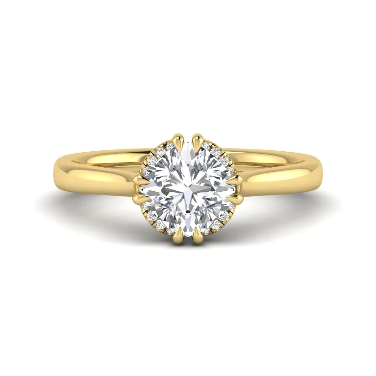 Cushion cut lab grown diamond solitaire engagement ring with double claw prongs, diamond-accented open cathedral gallery, and polished yellow gold band.