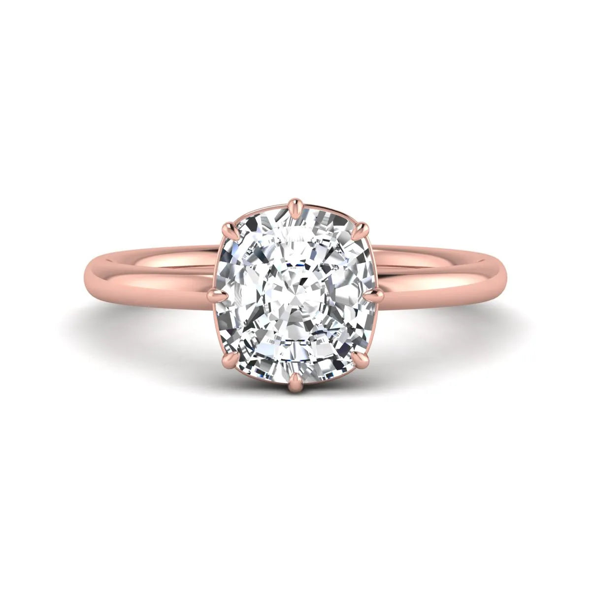 Cushion cut lab grown diamond solitaire engagement ring featuring an eight-prong setting with a polished rose gold band.