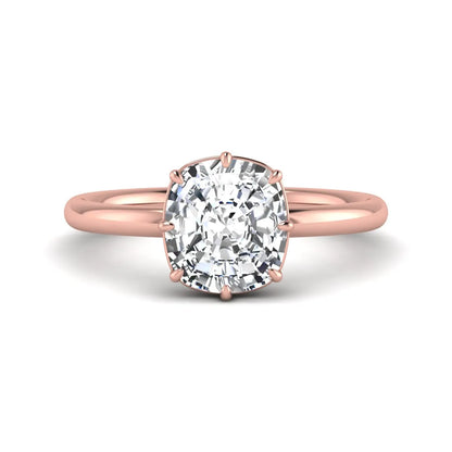 Cushion cut lab grown diamond solitaire engagement ring featuring an eight-prong setting with a polished rose gold band.