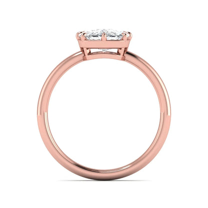 Cushion cut lab grown diamond solitaire engagement ring featuring an eight-prong setting with a polished rose gold band.