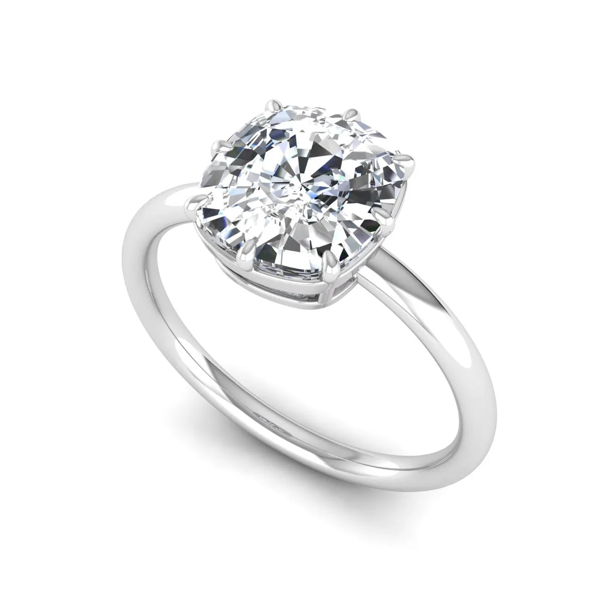 Cushion cut lab grown diamond solitaire engagement ring featuring an eight-prong setting with a polished white gold band.