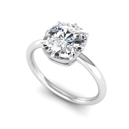 Cushion cut lab grown diamond solitaire engagement ring featuring an eight-prong setting with a polished white gold band.