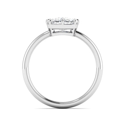Cushion cut lab grown diamond solitaire engagement ring featuring an eight-prong setting with a polished white gold band.