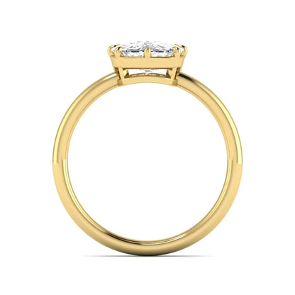 Cushion cut lab grown diamond solitaire engagement ring featuring an eight-prong setting with a polished yellow gold band.