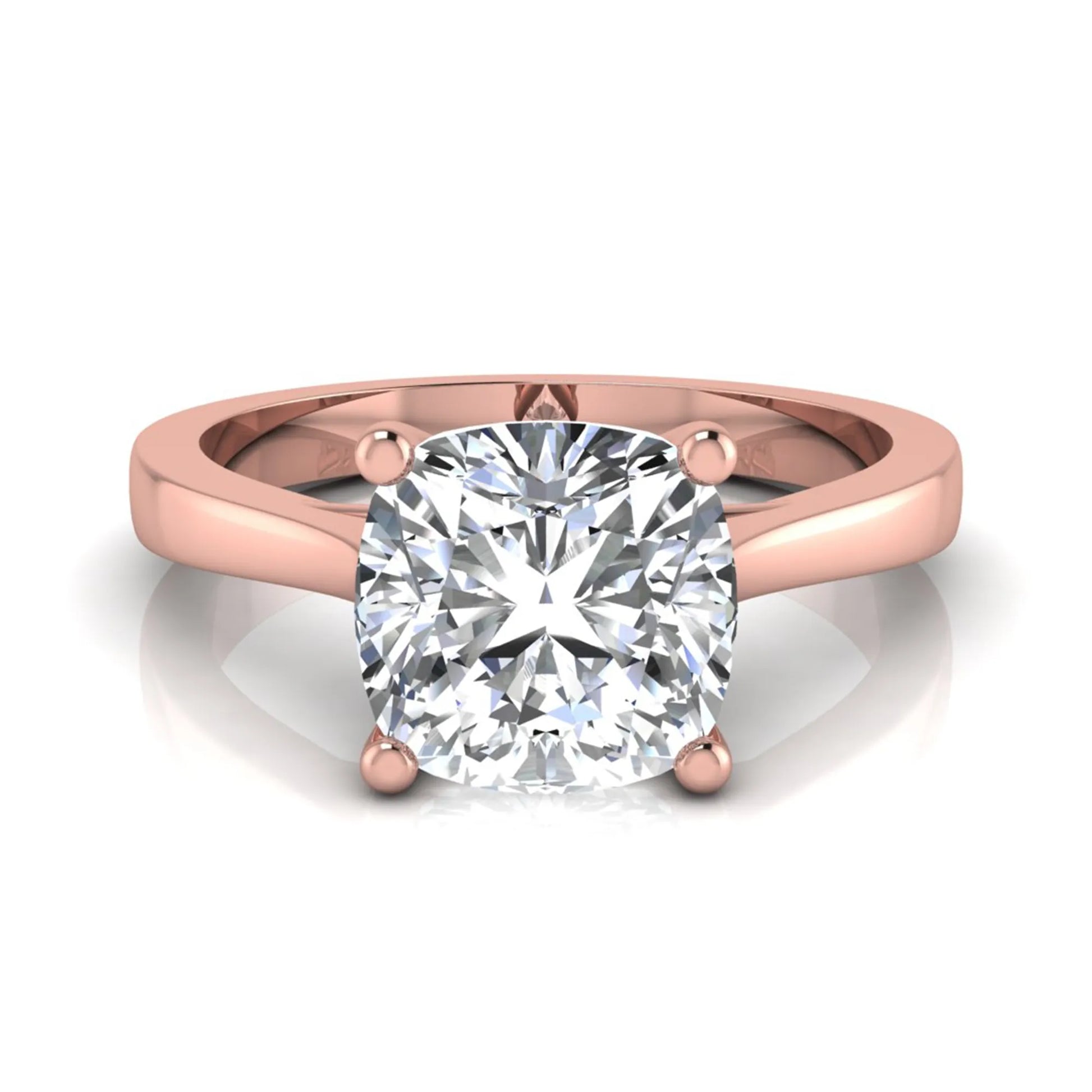 Cushion cut lab grown diamond solitaire engagement ring featuring an IGI certified center diamond in a classic four-prong setting with a polished band in rose gold