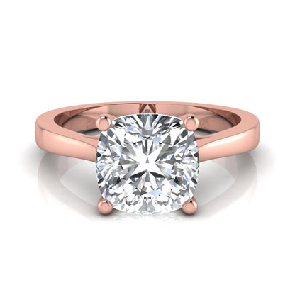 Cushion cut lab grown diamond solitaire engagement ring featuring an IGI certified center diamond in a classic four-prong setting with a polished band in rose gold