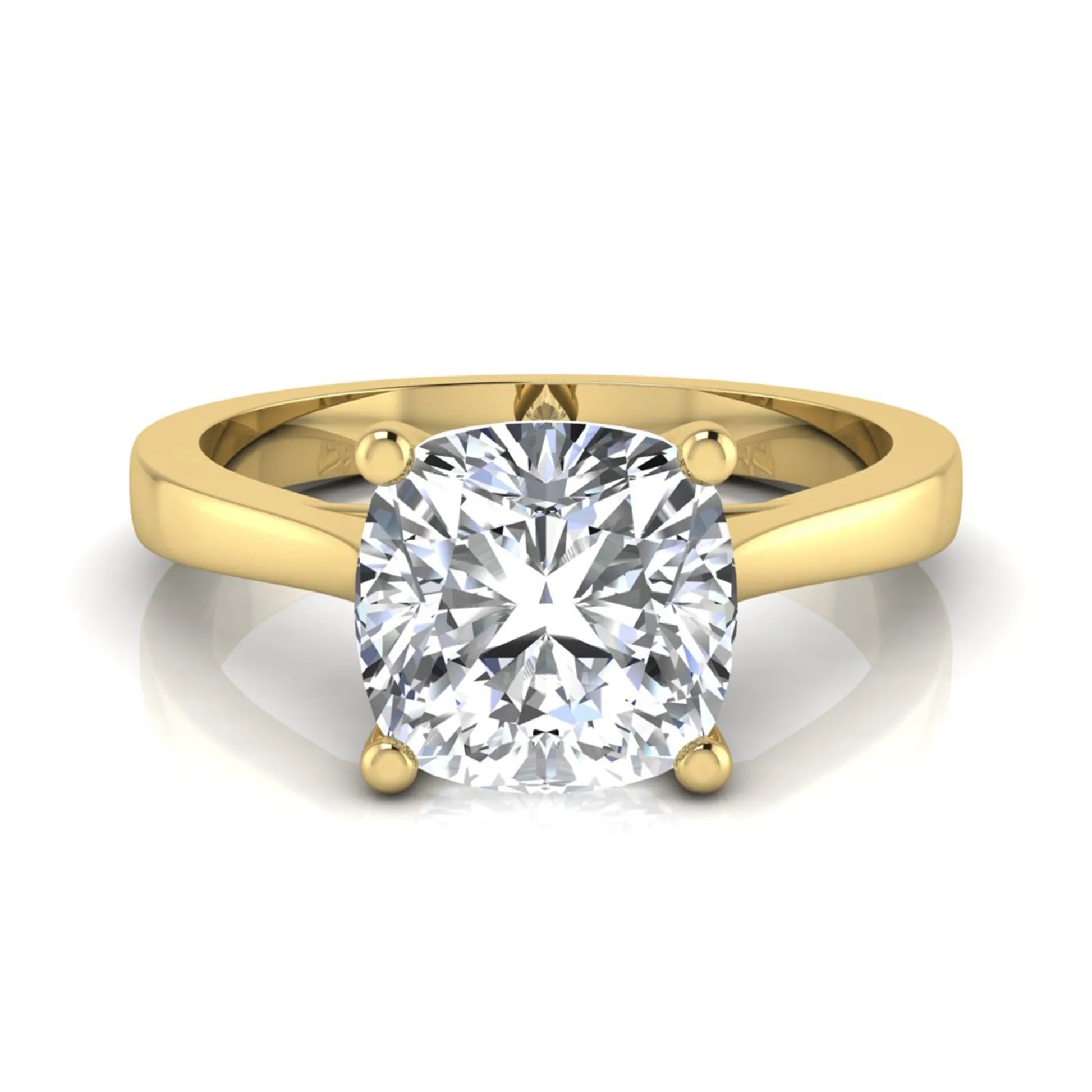 Cushion cut lab grown diamond solitaire engagement ring featuring an IGI certified center diamond in a classic four-prong setting with a polished band in yellow gold