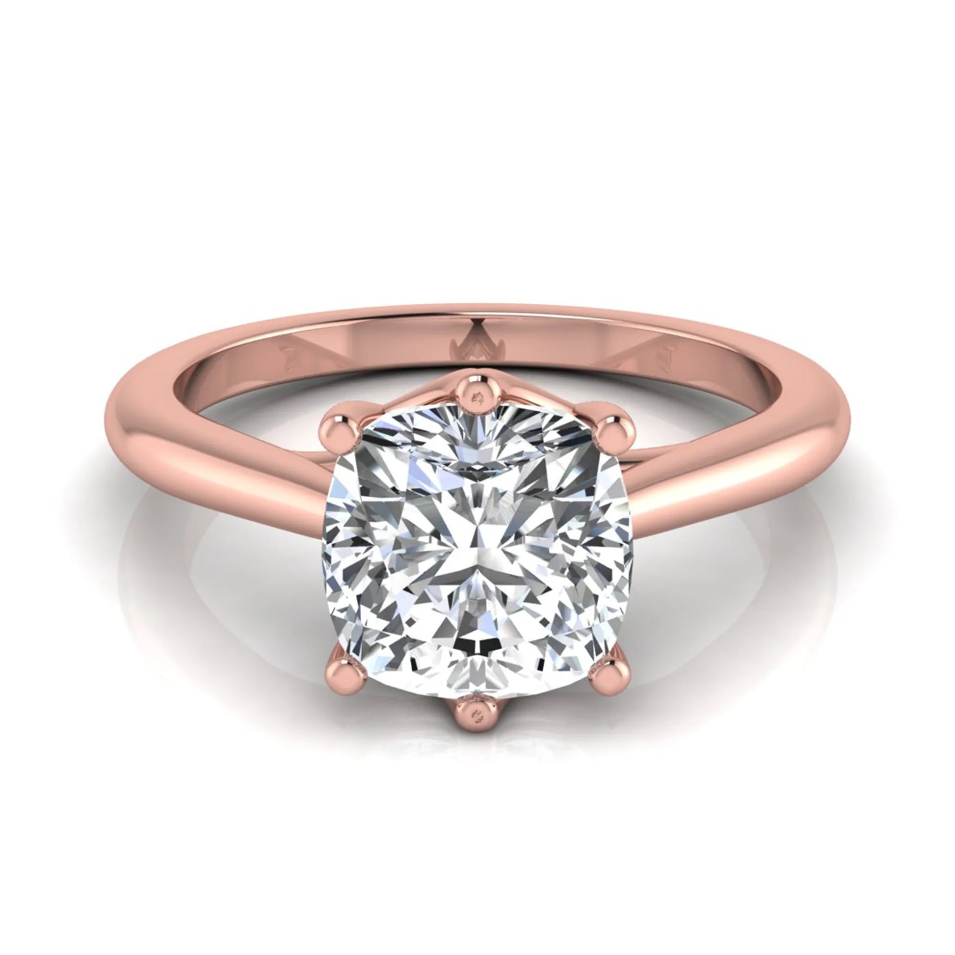 Cushion cut lab grown diamond solitaire engagement ring with a six prong setting in a rose gold tone, featuring an IGI certified 1.67 carat center diamond.