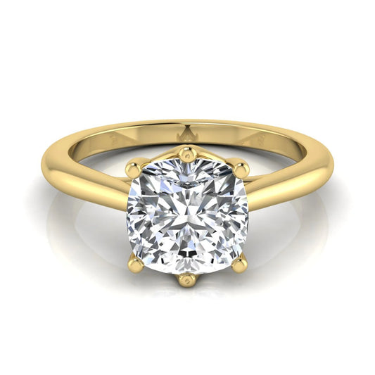 Cushion cut lab grown diamond solitaire engagement ring with a six prong setting in a yellow gold tone, featuring an IGI certified 1.67 carat center diamond.