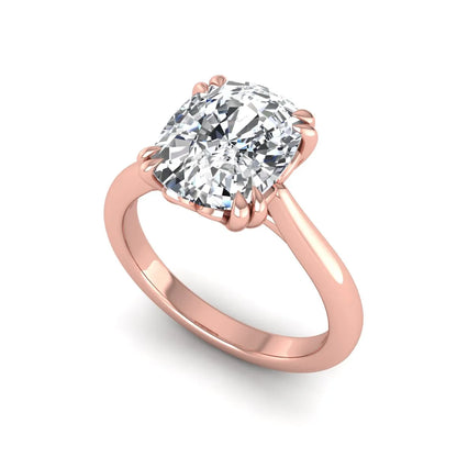 Cushion cut lab grown diamond solitaire engagement ring featuring a six-prong center diamond on a polished rose gold band.