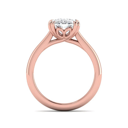Cushion cut lab grown diamond solitaire engagement ring featuring a six-prong center diamond on a polished rose gold band.