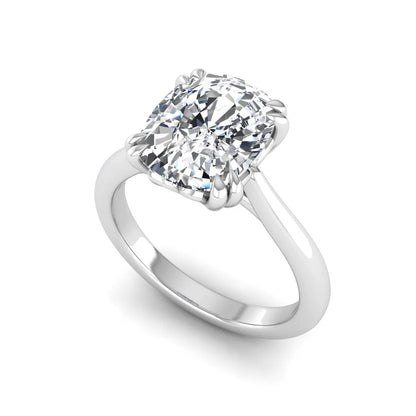 Cushion cut lab grown diamond solitaire engagement ring featuring a six-prong center diamond on a polished white gold band.