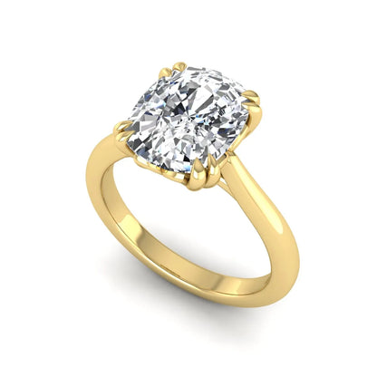 Cushion cut lab grown diamond solitaire engagement ring featuring a six-prong center diamond on a polished yellow gold band.