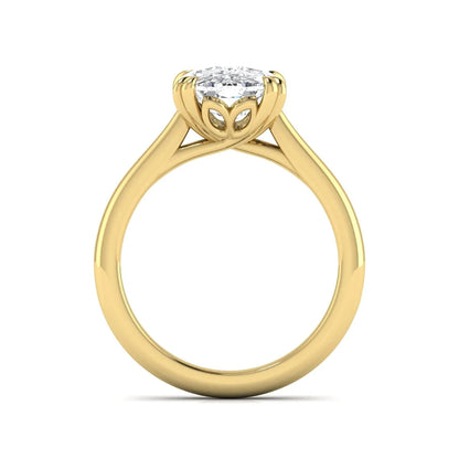 Cushion cut lab grown diamond solitaire engagement ring featuring a six-prong center diamond on a polished yellow gold band.