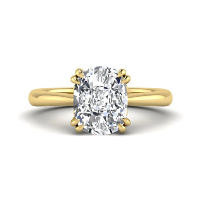 Cushion cut lab grown diamond solitaire engagement ring featuring a six-prong center diamond on a polished yellow gold band.