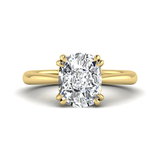 Cushion cut lab grown diamond solitaire engagement ring featuring a six-prong center diamond on a polished yellow gold band.