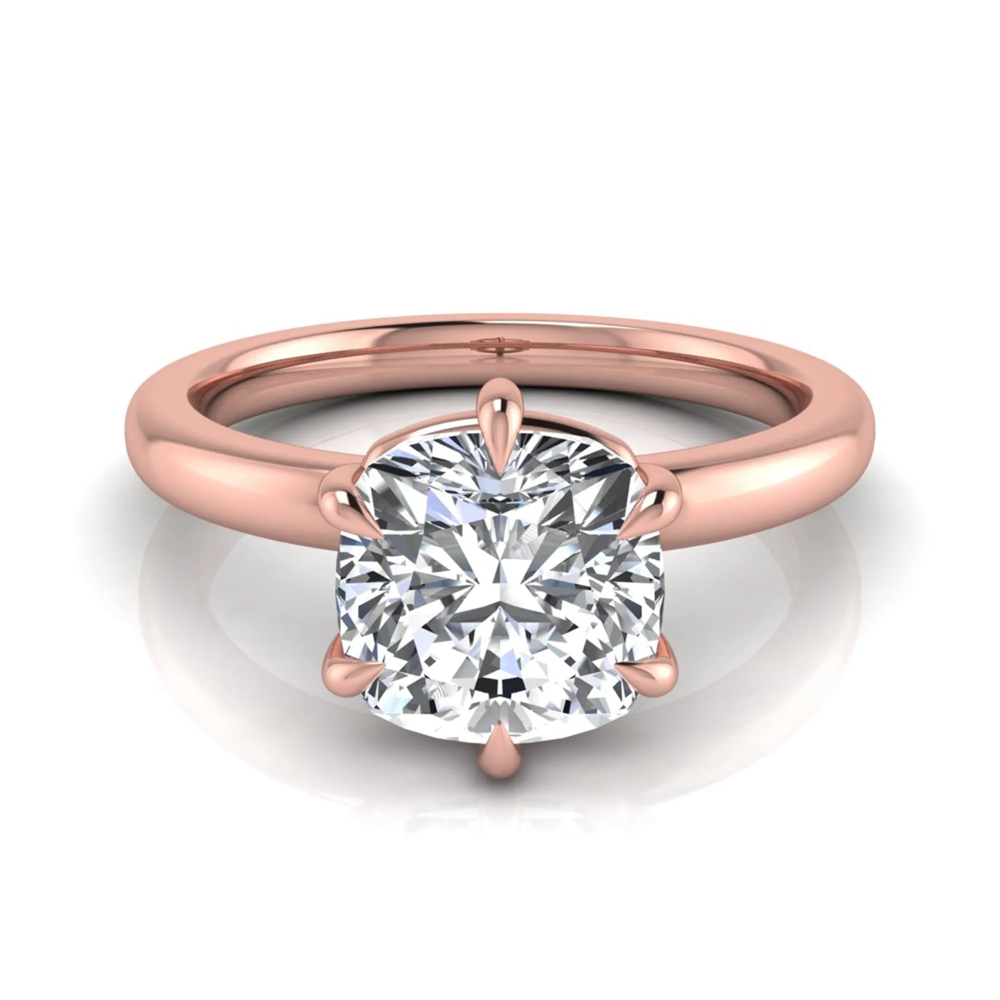 Cushion cut lab grown diamond engagement ring featuring a 1.28 carat IGI certified center diamond in a classic four-prong solitaire setting with a polished rose gold band.