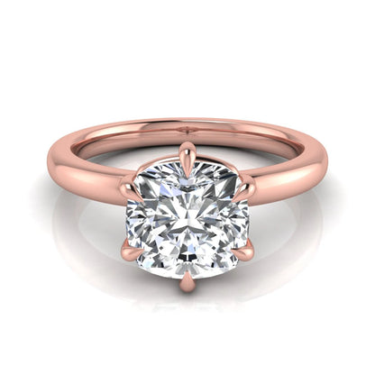 Cushion cut lab grown diamond engagement ring featuring a 1.28 carat IGI certified center diamond in a classic four-prong solitaire setting with a polished rose gold band.