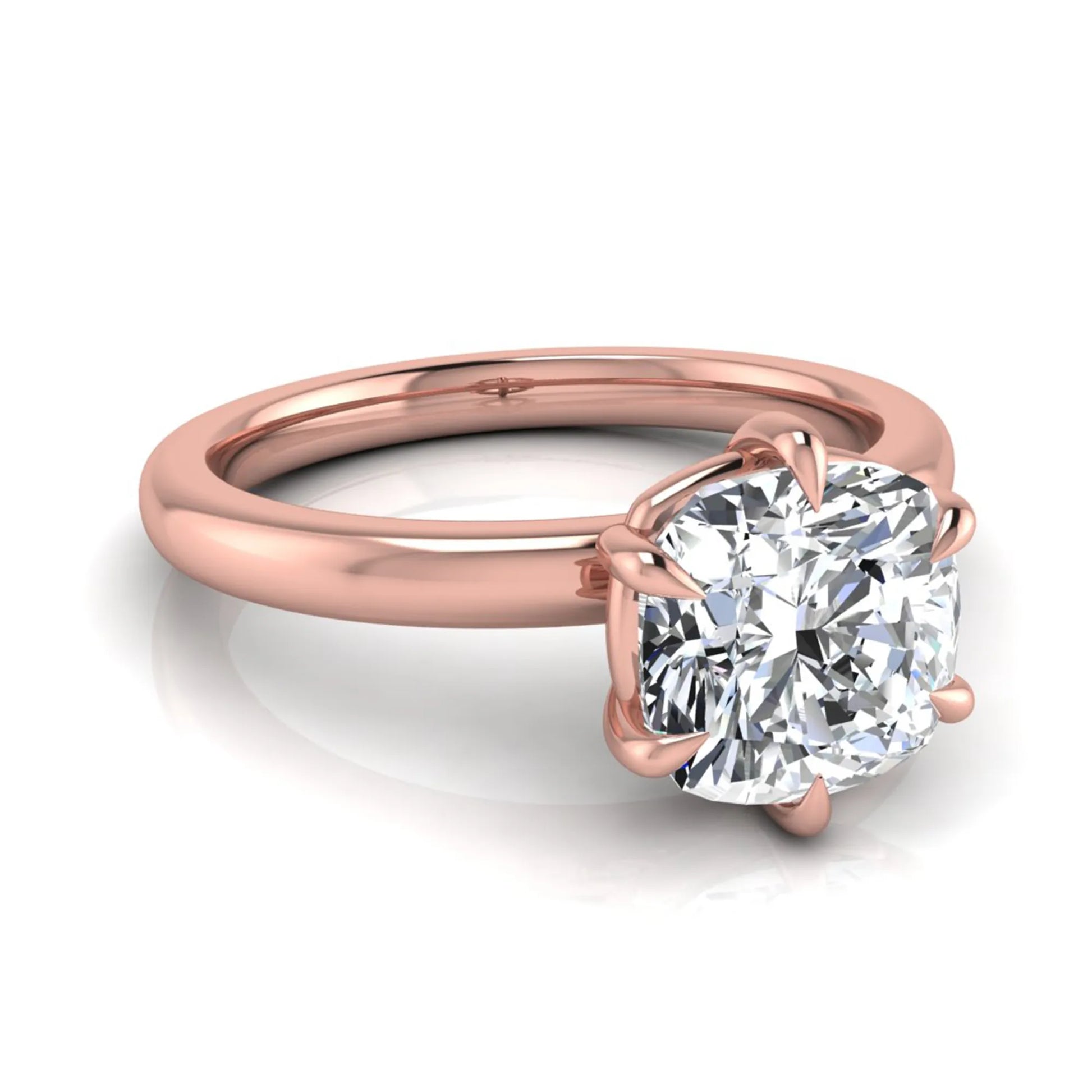 Cushion cut lab grown diamond engagement ring featuring a 1.28 carat IGI certified center diamond in a classic four-prong solitaire setting with a polished rose gold band.