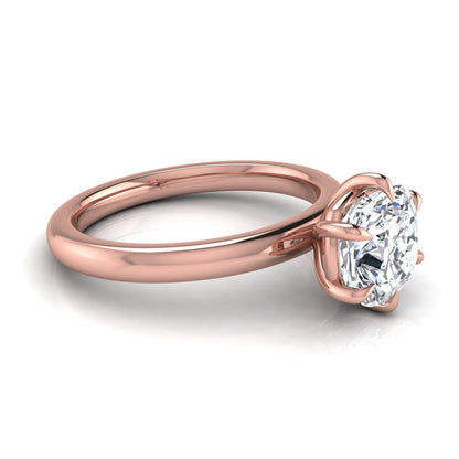 Cushion cut lab grown diamond engagement ring featuring a 1.28 carat IGI certified center diamond in a classic four-prong solitaire setting with a polished rose gold band.