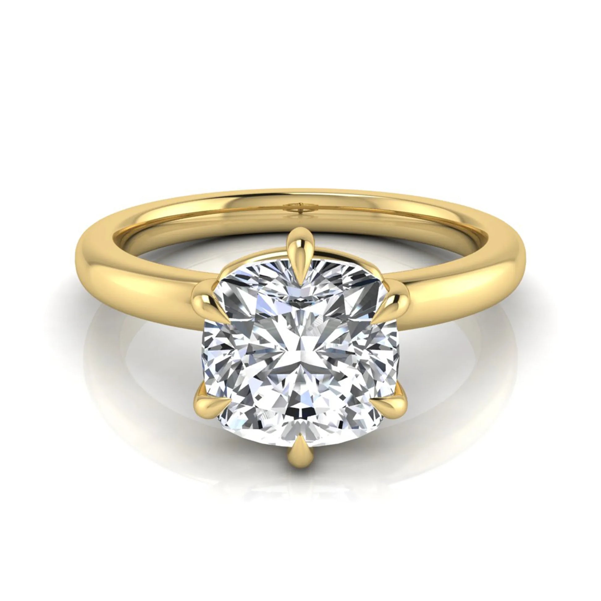 Cushion cut lab grown diamond engagement ring featuring a 1.28 carat IGI certified center diamond in a classic four-prong solitaire setting with a polished yellow gold band.