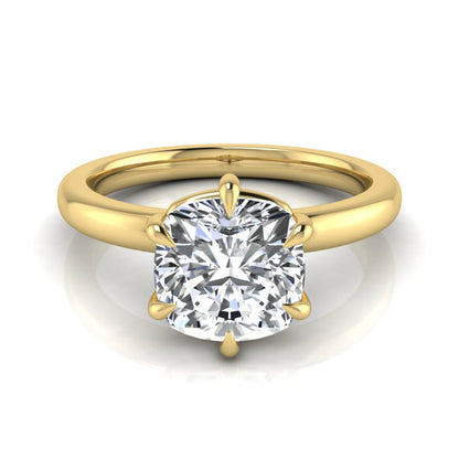 Cushion cut lab grown diamond engagement ring featuring a 1.28 carat IGI certified center diamond in a classic four-prong solitaire setting with a polished yellow gold band.