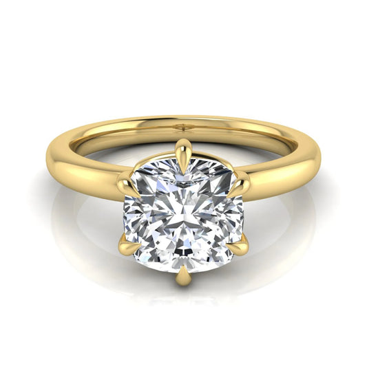 Cushion cut lab grown diamond engagement ring featuring a 1.28 carat IGI certified center diamond in a classic four-prong solitaire setting with a polished yellow gold band.
