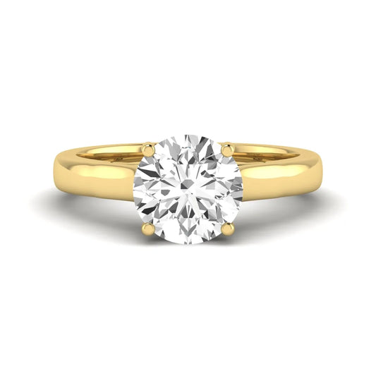 Cushion Solitaire Lab Grown Diamond Engagement Ring featuring a 7.50 mm cushion-cut center diamond in a four-prong cathedral solitaire setting in yellow gold