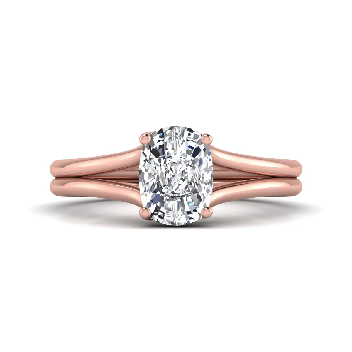 Cushion cut lab grown diamond solitaire engagement ring featuring a split shank band and four-prong setting in polished rose gold.