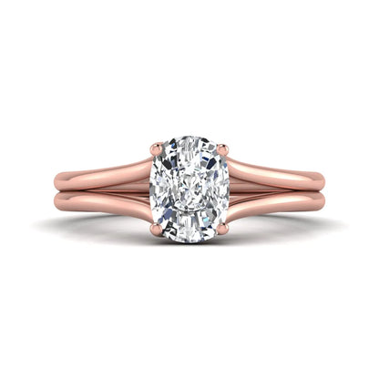Cushion cut lab grown diamond solitaire engagement ring featuring a split shank band and four-prong setting in polished rose gold.