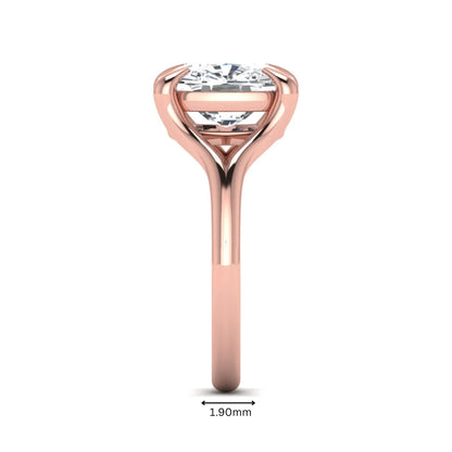 IGI Certified 2.97 carat cushion cut lab grown diamond split shank engagement ring with claw prong setting in rose gold.