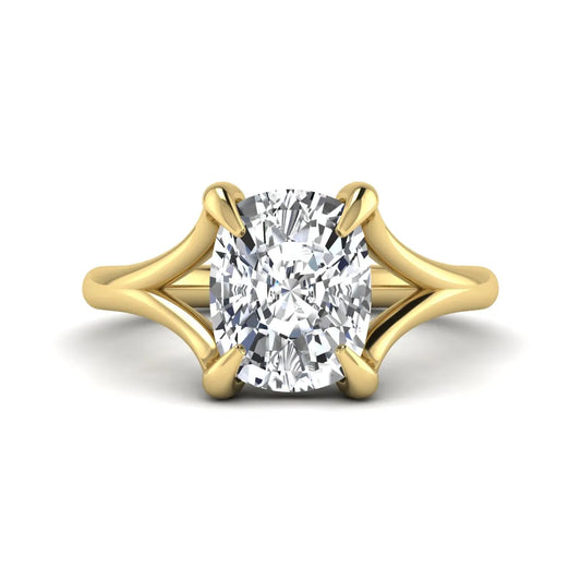 IGI Certified 2.97 carat cushion cut lab grown diamond split shank engagement ring with claw prong setting in yellow gold.