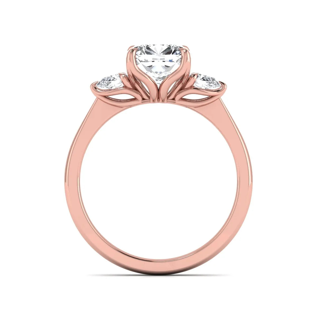 Cushion cut three stone lab grown diamond engagement ring featuring a 1.67 carat IGI certified center diamond with pear side diamonds in rose gold.