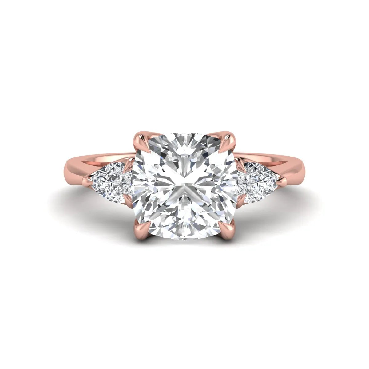 Cushion cut three stone lab grown diamond engagement ring featuring a 1.67 carat IGI certified center diamond with pear side diamonds in rose gold.