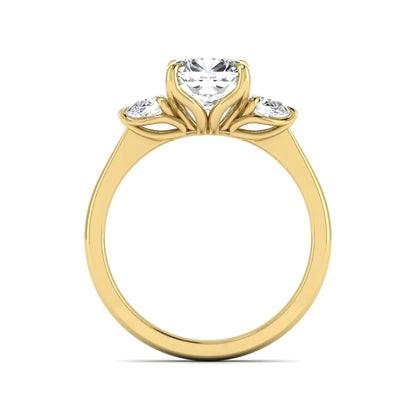 Cushion cut three stone lab grown diamond engagement ring featuring a 1.67 carat IGI certified center diamond with pear side diamonds in yellow gold.