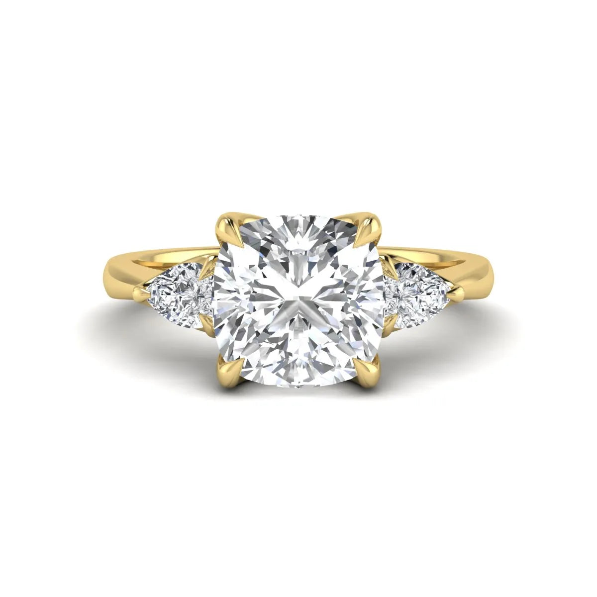 Cushion cut three stone lab grown diamond engagement ring featuring a 1.67 carat IGI certified center diamond with pear side diamonds in yellow gold.