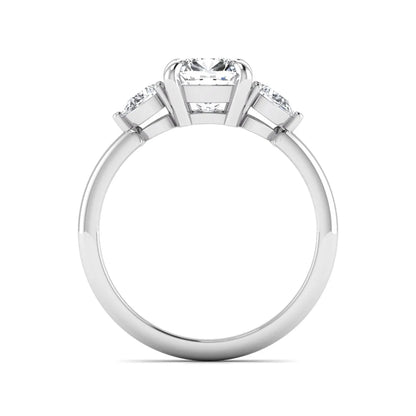 Cushion cut lab grown diamond three stone engagement ring with pear cut side diamonds in a classic prong setting in white gold