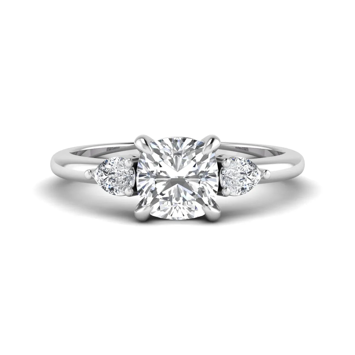Cushion cut lab grown diamond three stone engagement ring with pear cut side diamonds in a classic prong setting in white gold