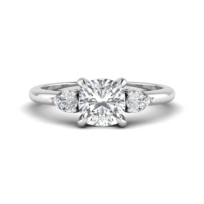 Cushion cut lab grown diamond three stone engagement ring with pear cut side diamonds in a classic prong setting in white gold