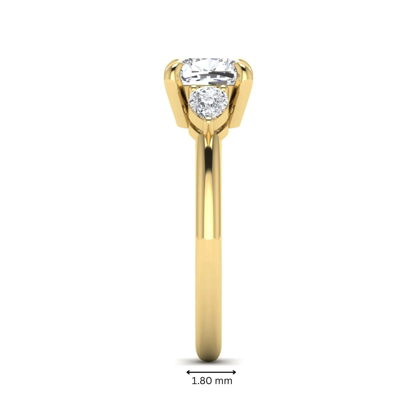 Cushion cut lab grown diamond three stone engagement ring with pear cut side diamonds in a classic prong setting in yellow gold