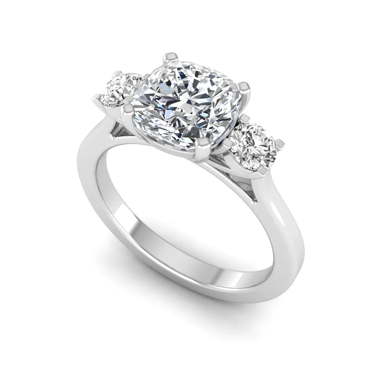 Cushion cut lab grown diamond three stone engagement ring featuring a cushion center diamond with round brilliant side diamonds on a polished white gold band.