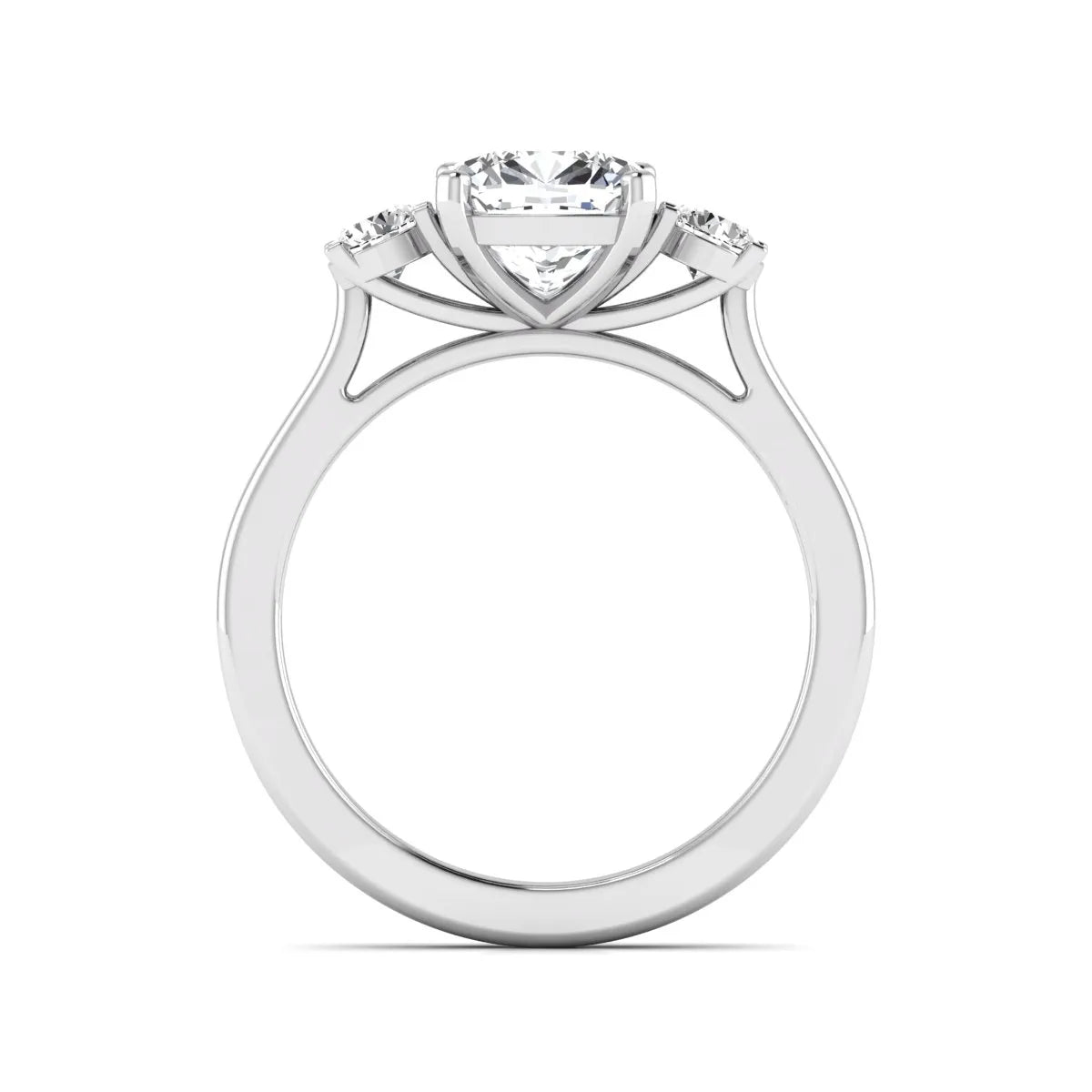 Cushion cut lab grown diamond three stone engagement ring featuring a cushion center diamond with round brilliant side diamonds on a polished white gold band.