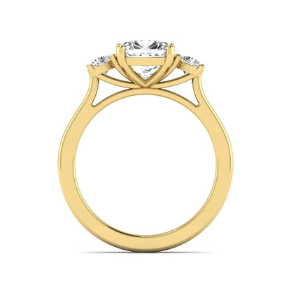 Cushion cut lab grown diamond three stone engagement ring featuring a cushion center diamond with round brilliant side diamonds on a polished yellow gold band.