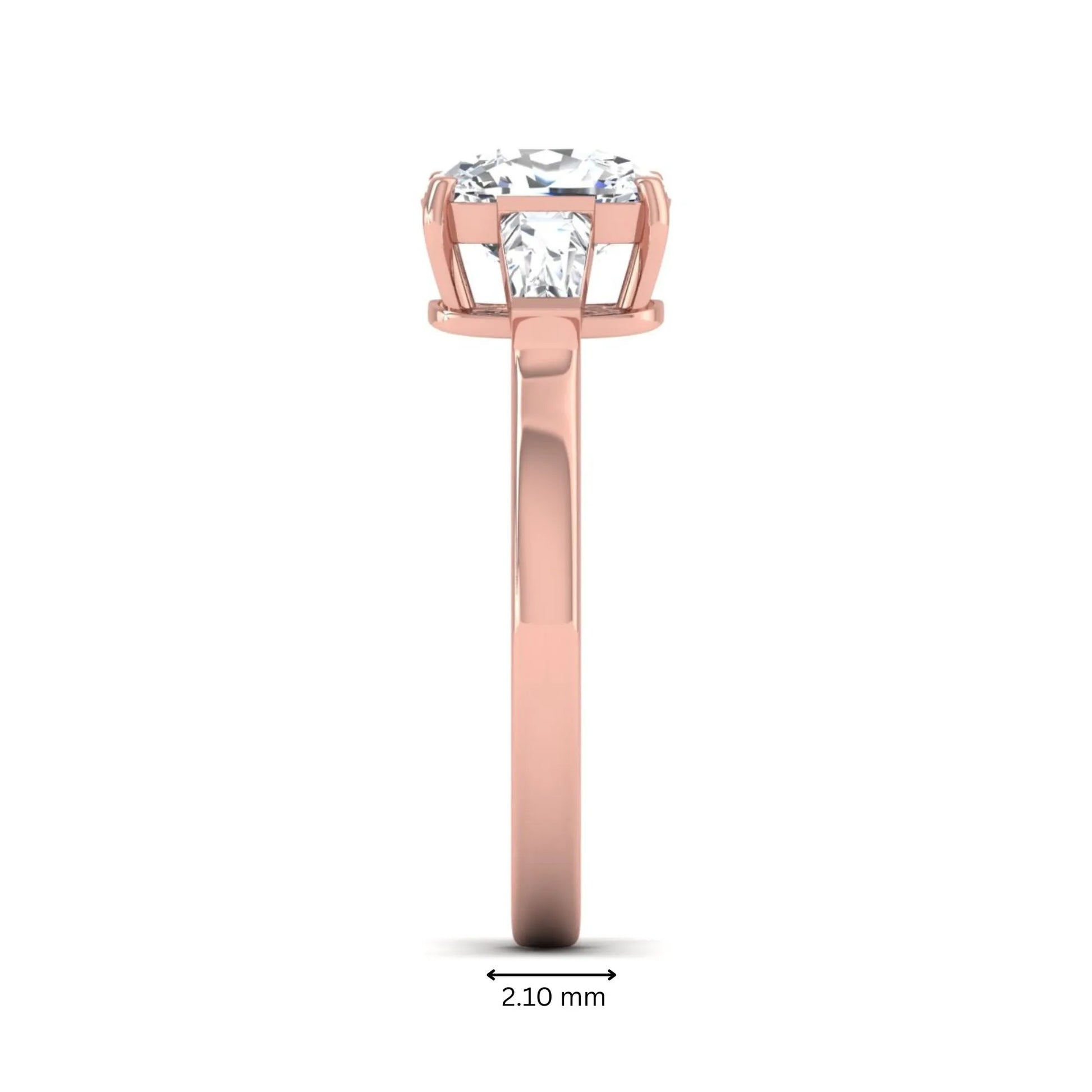 Cushion cut lab grown diamond three stone engagement ring with baguette side diamonds in a four prong setting and rose gold tone band.