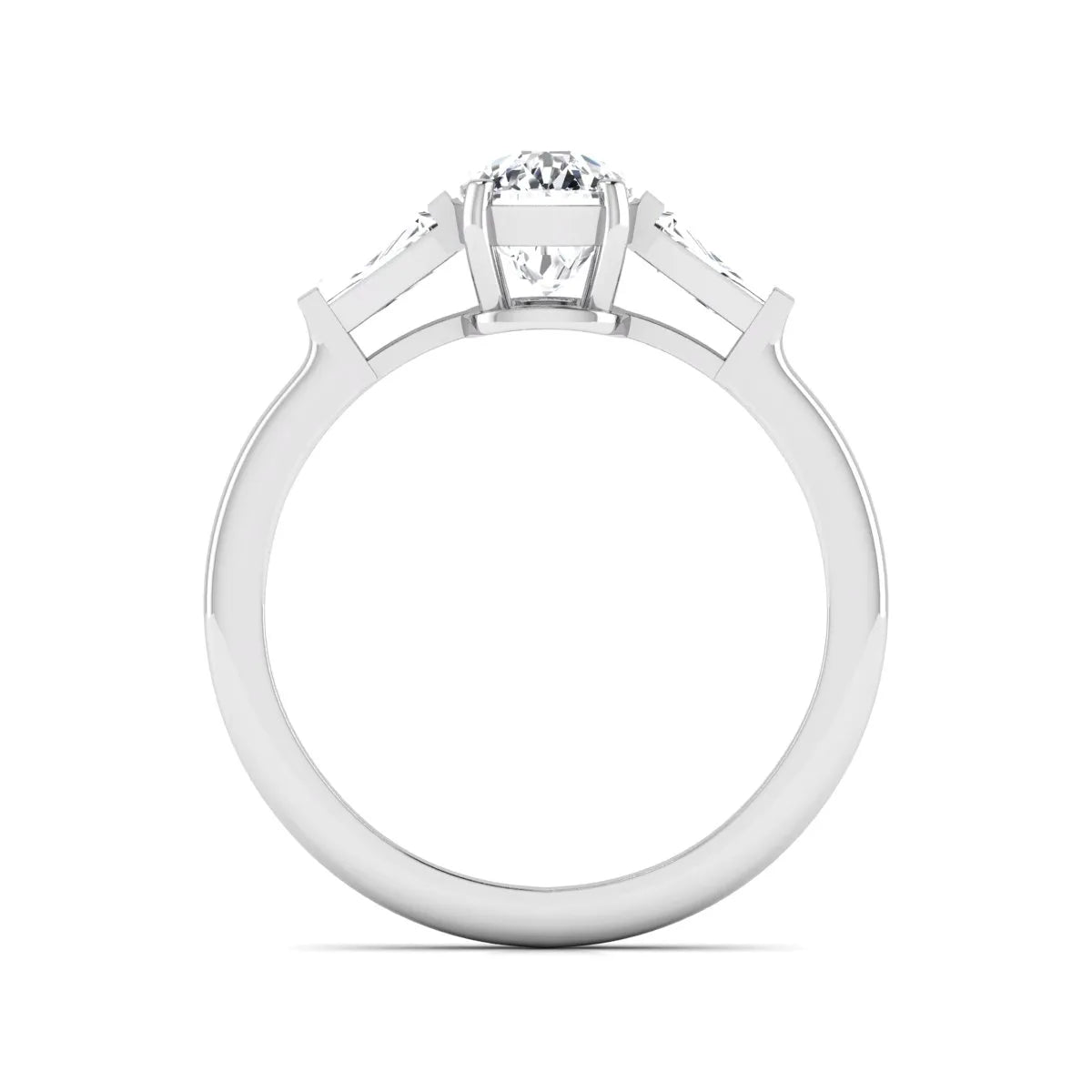 Cushion cut lab grown diamond three stone engagement ring with baguette side diamonds in a four prong setting and white gold tone band.