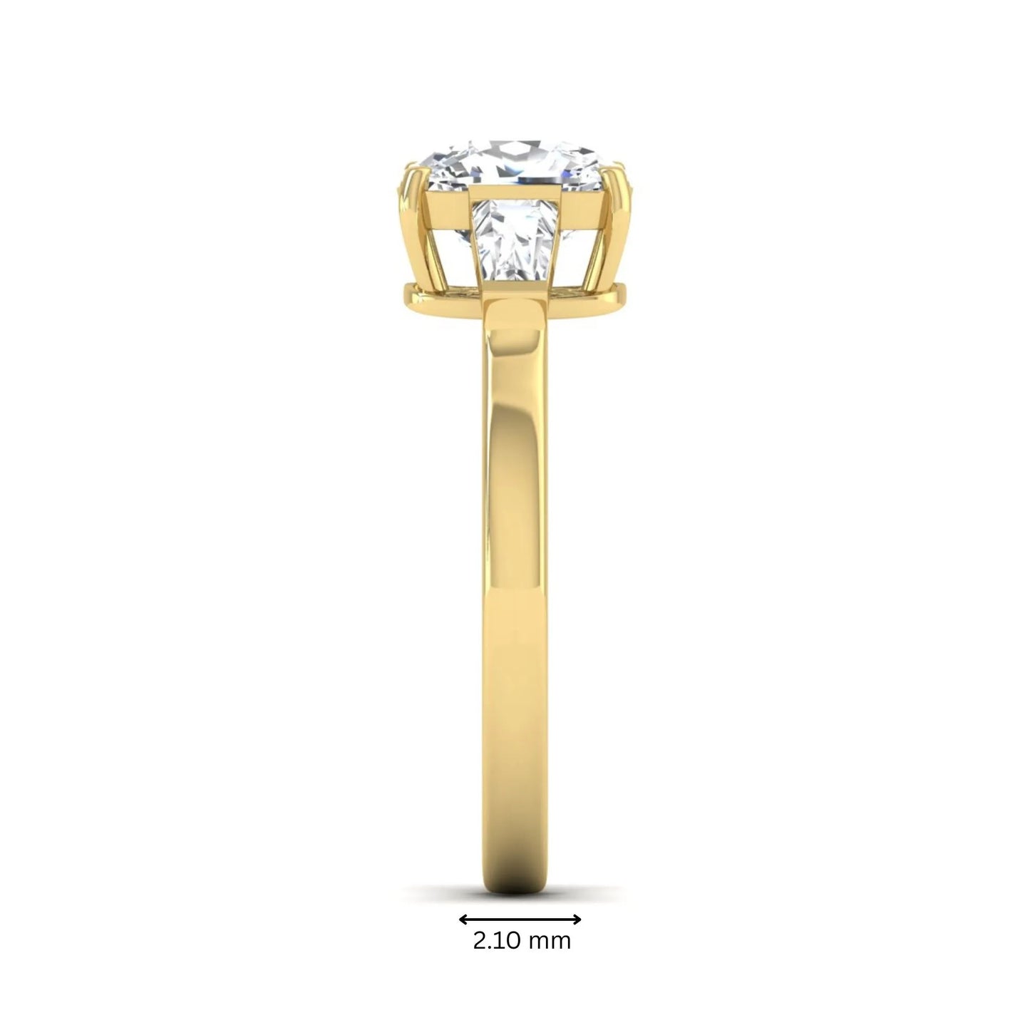 Cushion cut lab grown diamond three stone engagement ring with baguette side diamonds in a four prong setting and yellow gold tone band.