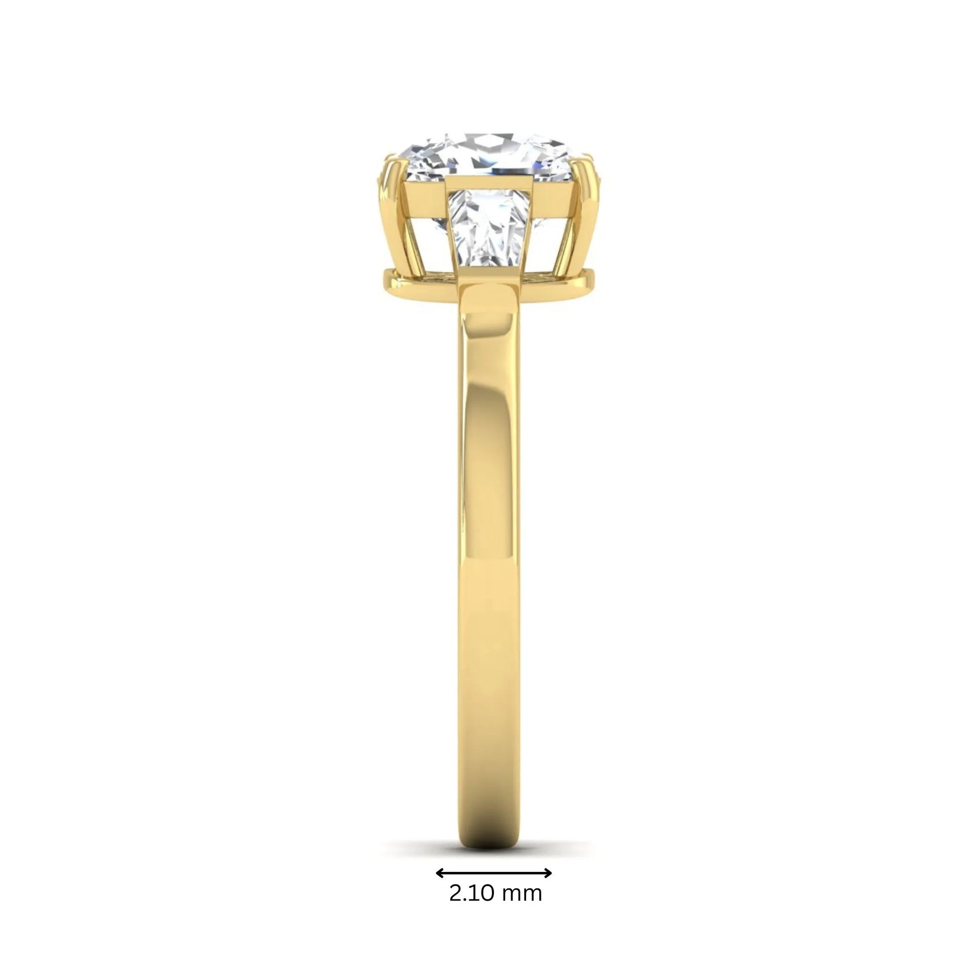 Cushion cut lab grown diamond three stone engagement ring with baguette side diamonds in a four prong setting and yellow gold tone band.